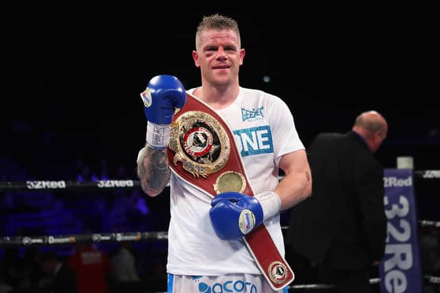 Callum Johnson celebrates winning the WBO Global Heavyweight title in 2021.