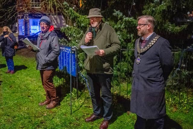 Stephen Holdaway, Tim Peacock and Mayor Matt Wilkinson at the lighting ceremony.