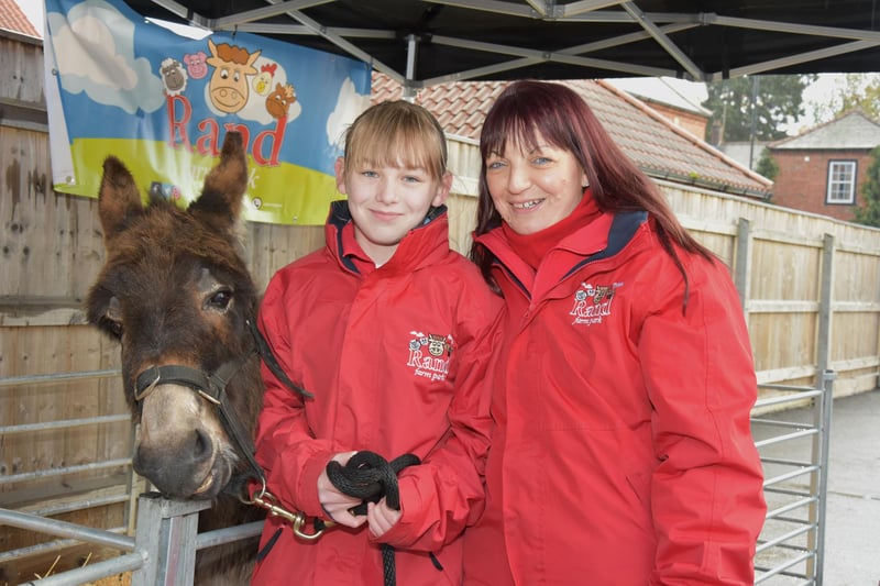 Mother and daughter Emma and Ava Baldock with Roma the donkey from Rand Farm Park