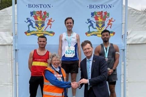 The men's podium presentations at the end of the Marathon.