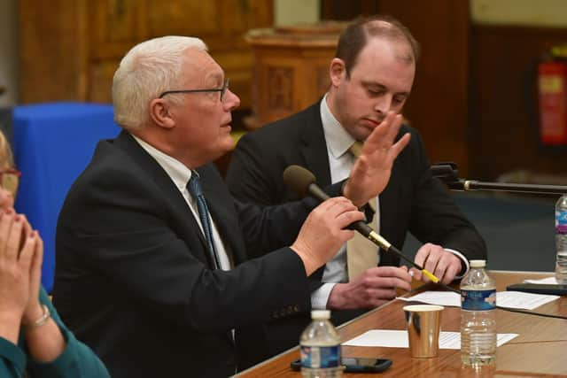 Council leader Coun Paul Skinner addresses the audience, with Boston and Skegness MP Matt Warman pictured, right.