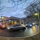 Customers queuing at the new Starbucks drive-thru at 6am for its opening.