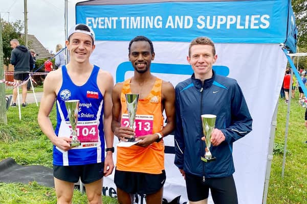 The first three finishers at the Gainsborough & Morton 10k on Sunday, with strider Jordan Skelly on the left. Photo credit Tape2Tape Events.