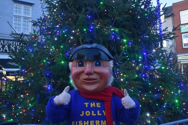 The Jolly Fisherman gives the Skegness Town Council Christmas Tree the thumbs-up.