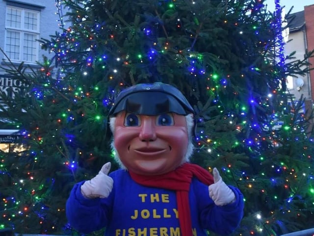 The Jolly Fisherman gives the Skegness Town Council Christmas Tree the thumbs-up.