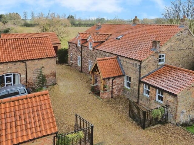 The main house on the right, the annexe on the left.