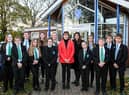 Victoria Atkins (centre) with Somercotes Academy Careers Leader Laura Brown (left) and Principal Frances Green plus some of the students who attended the question-and-answer session. Photo by Jon Corken