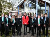 Victoria Atkins (centre) with Somercotes Academy Careers Leader Laura Brown (left) and Principal Frances Green plus some of the students who attended the question-and-answer session. Photo by Jon Corken