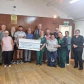 The presentation event following the Mayhem Gym fundraiser in aid of the Boston Pulmonary Fibrosis Support Group. Tom and Sarah Chenery are pictured presenting the cheque to group founder Clare Verrall-Champion.