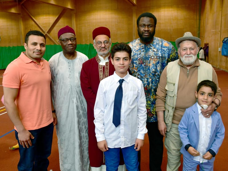 Pictured (from left) Moustafa Abouelkhir, Abdulmalik Bako, Abdulhameed Qureshi, Marwn Alrfay, 14, Ahmad Oladosu, Majid Kabani, and Mayar Alrfay, seven.