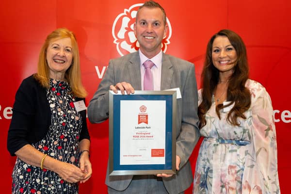 Richard Bestwick, managing director of Don Amott's Lakeside Park, receives the prestigious award, flanked by his wife Laura (right) and Lady Victoria Borwick, chair of VisitEngland. (PHOTO BY: Kit Fanner, of On Location Events)