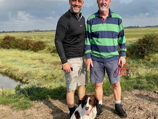 Rob Wright, left, and Jez Hyland with Jez’s spaniel Ruby.