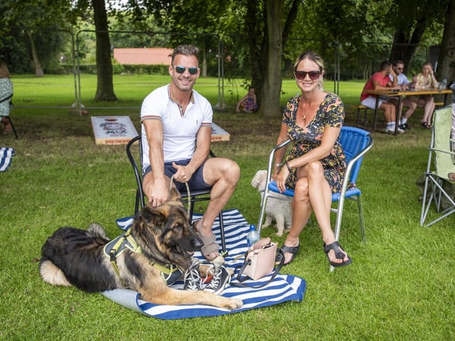 Lawrence Baird and Sara Needham with their dog.