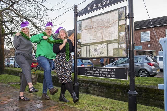 Kirsty Sinclair (left) and Kathryn Locke of Ruskington Parish Council with Kenny Woods – Quickline Community Engagement Executive. Quickline have donated the Parish Council £500 to go towards Christmas Lights. Picture: Sean Spencer/Hull News & Pictures Ltd
