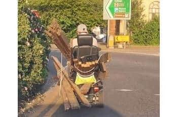 Reader Tomasz Tomczuk took this photo of the mobility scooter rider as it approached John Adams Way.