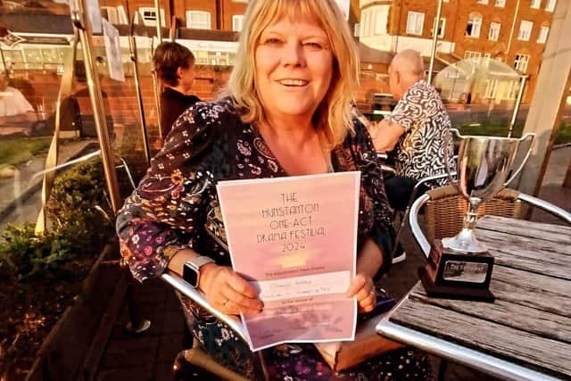 Cheryl Valley with her Best Actress trophy.