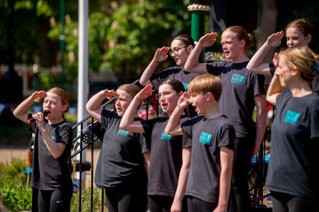 Stage Door Productions performing at the Skegness RBL VE picnic in park.