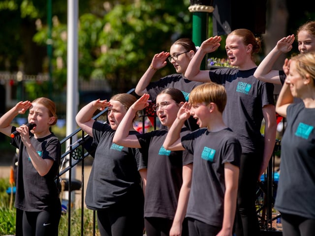 Stage Door Productions performing at the Skegness RBL VE picnic in park.