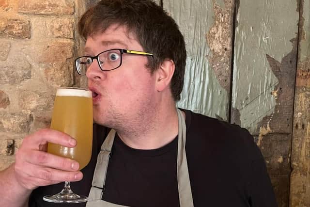 A well-earned celebratory drink for Gareth Bartram, the chef at The Auction House restaurant in Louth.