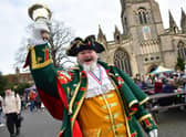 Town Crier John Griffifths rings in the Sleaford Christmas Market.