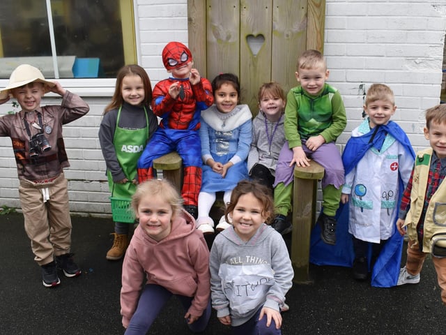 Children dressed as colourful characters for World Book Day.