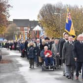 Skegness Remembrance Parade heads to the memorial at St Matthew's Church.