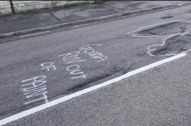 "Gonna run out of paint" spray painted on Ermine Street in Ancaster.