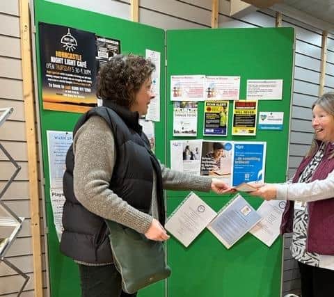Isabel Forrester (left) of the Making Links CIC hands out advice.