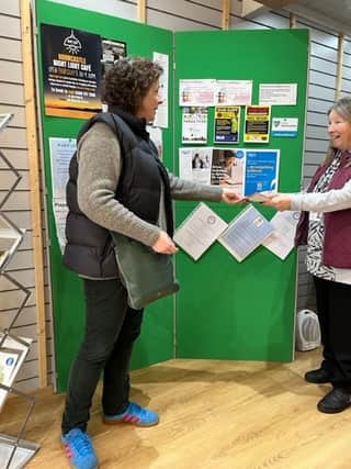 Isabel Forrester (left) of the Making Links CIC hands out advice.