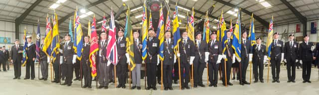 Les Constantine (third left) carrying the Burma Star standard for the final time.