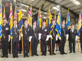 Les Constantine (third left) carrying the Burma Star standard for the final time.