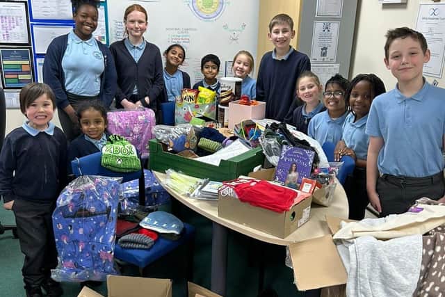 St Nicholas CE Primary's Little FISH (School Council) with some of the recent donations