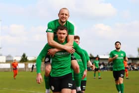 Jacob Fenton is congratulated after netting from the spot on Saturday. Photo: Steve W Davies Photography.