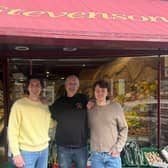 Pete Stevenson (centre) hands over the reins of the historic shop in Louth to entrepreneurs Jonny Janney-Cryans (left) and Ashley Janney-Cryans.