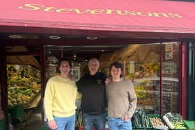 Pete Stevenson (centre) hands over the reins of the historic shop in Louth to entrepreneurs Jonny Janney-Cryans (left) and Ashley Janney-Cryans.