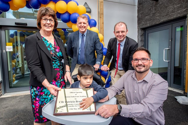 Pictured with the new school plaque are Coun Patricia Bradshaw portfolio holder for Children's services at Lincolnshire County Council, Peter Bell CEO Community Inclusive Trust, Matt Warman MP for Boston and Skegness, Aaron Bloodworth-Flat deputy head, and pupil Elijah Hawkins.