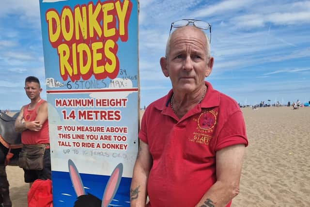 Donkey-ride operator John Nuttall says he is putting his animals first when asked about why he checks the height and weight of some children.
