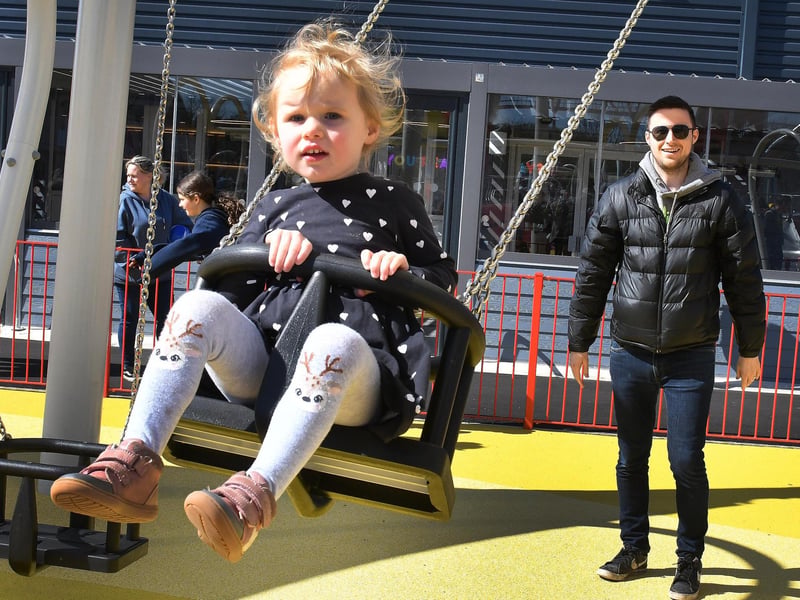 Three-year-old Amelie enjoying the swing with Joseph Cant from Darlington.