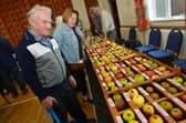 Richard and Ann Lane of East Barkwith browse the stalls at Wragby Apple Day. Photos: D.R.Dawson Photography