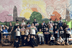 Boston Endeavour Academy celebrating its International School Award.