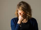 PICTURE POSED BY MODEL A woman showing signs of depression.