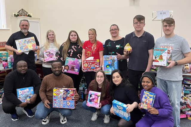 Lincolnshire Co-op colleagues present wrapping at Market Rasen.