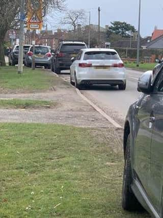 Cars parked on Louth Road.