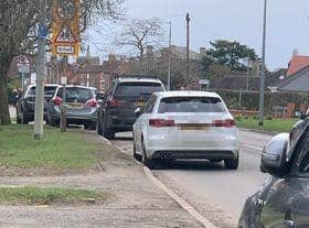 Cars parked on Louth Road.