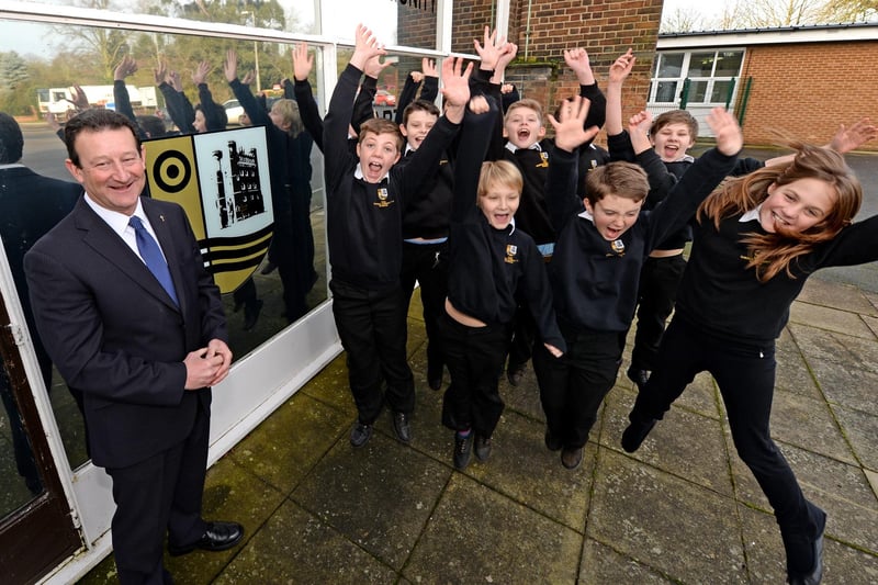 Gartree Community School, in Tattershall, celebrating plans to become an academy under the David Ross Education Trust. Pictured with pupils is headteacher Paul MacLeod.