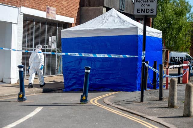Police forensics on the scene of the alleged murder in Fountain Lane, Boston, on Friday.