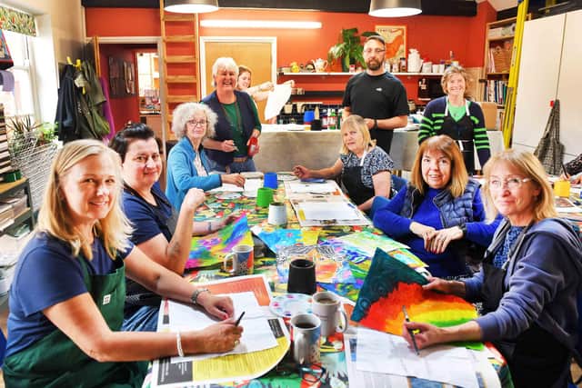Sketchbook Club members with (fourth from left) tutor Ruth Burrows