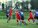 Player-boss Tom Ward gets up to head at goal during the defeat at Sherwood Colliery. Photo: Steve W Davies Photography.