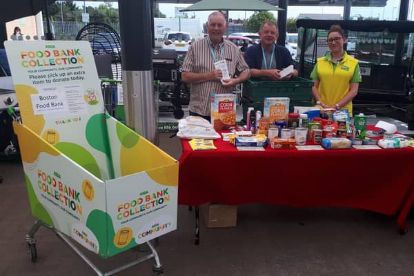 Helping collect donations for those in need, Asda and Boston Food Bank. Pictured (from left), Bob Taylor and Trevor Baily, of Boston Food Bank, and Michelle Holland, of Asda.