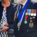 A highly-decorated veteran at Sleaford's Armed Forces Day flag-raising in 2023
